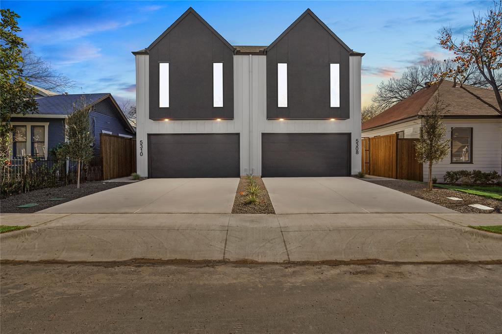 5308 Terry Street Dallas, TX 75223 - Photo 1 of 1 a front view of a house with garage