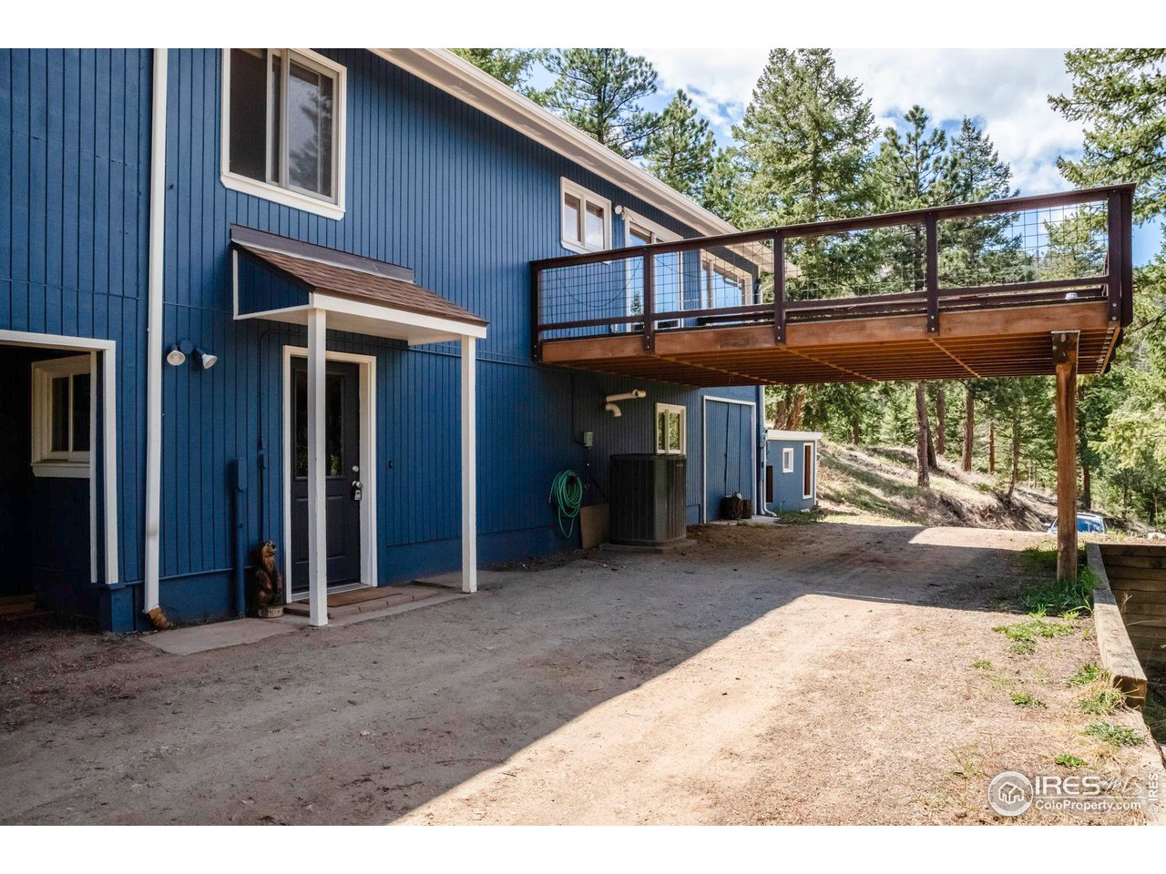 162 Alaska Road Boulder, CO 80302 - Photo 29 of 31 a view of a house with a porch