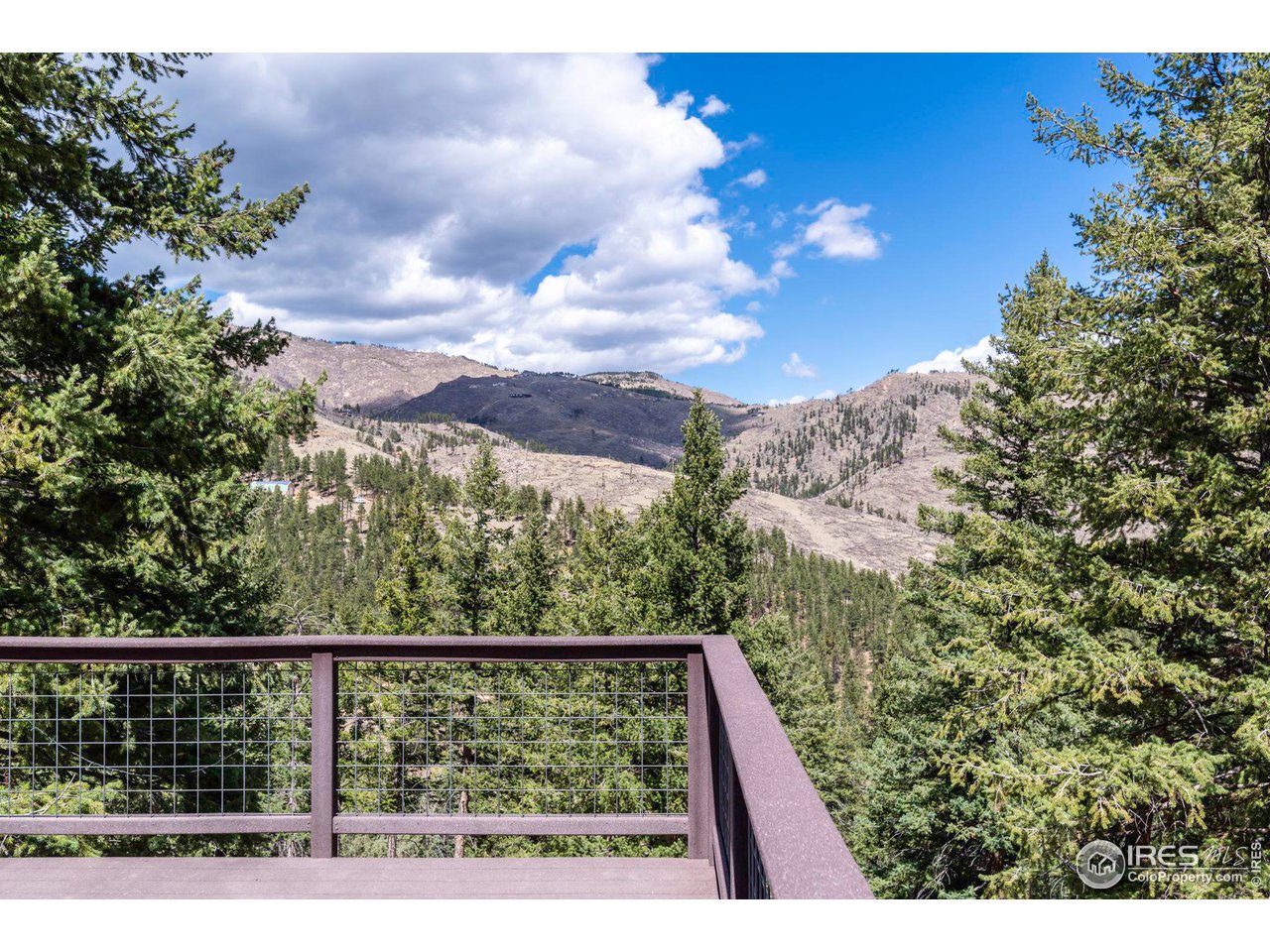 162 Alaska Road Boulder, CO 80302 - Photo 10 of 31 a view of mountain from a balcony