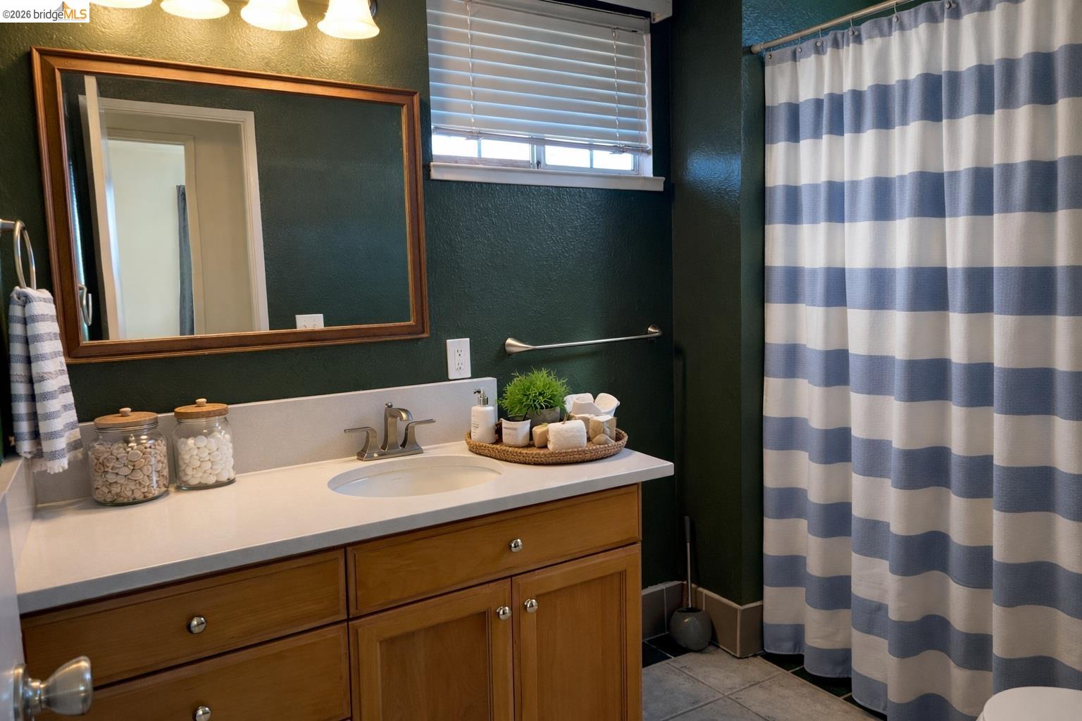 3816 Teek Court Ceres, CA 95307 - Photo 13 of 21 a bathroom with a sink and a mirror