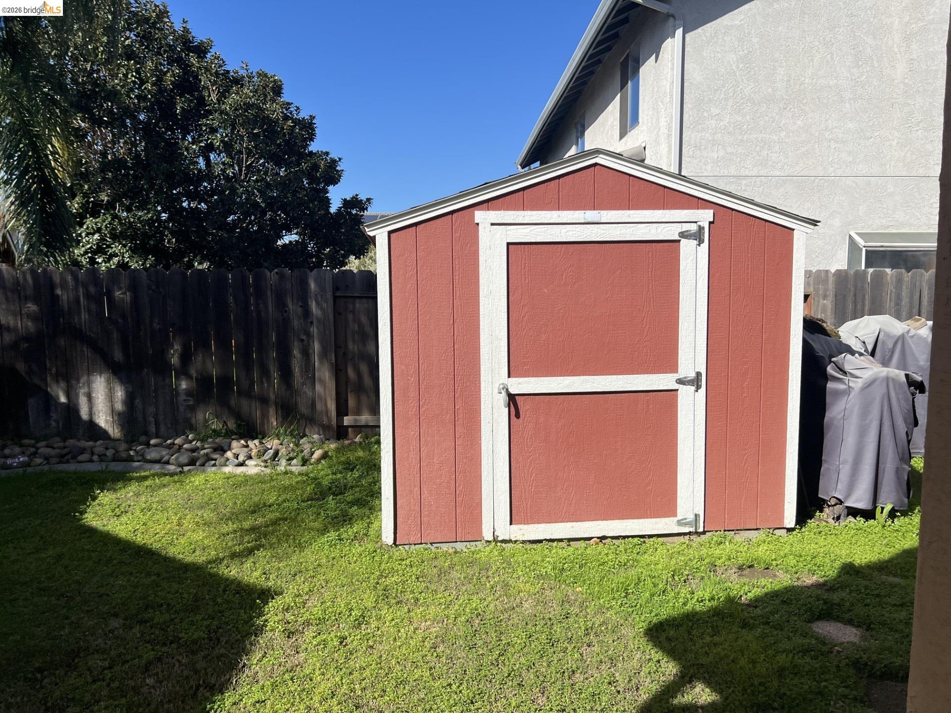 3816 Teek Court Ceres, CA 95307 - Photo 16 of 21 a front view of a house with garden