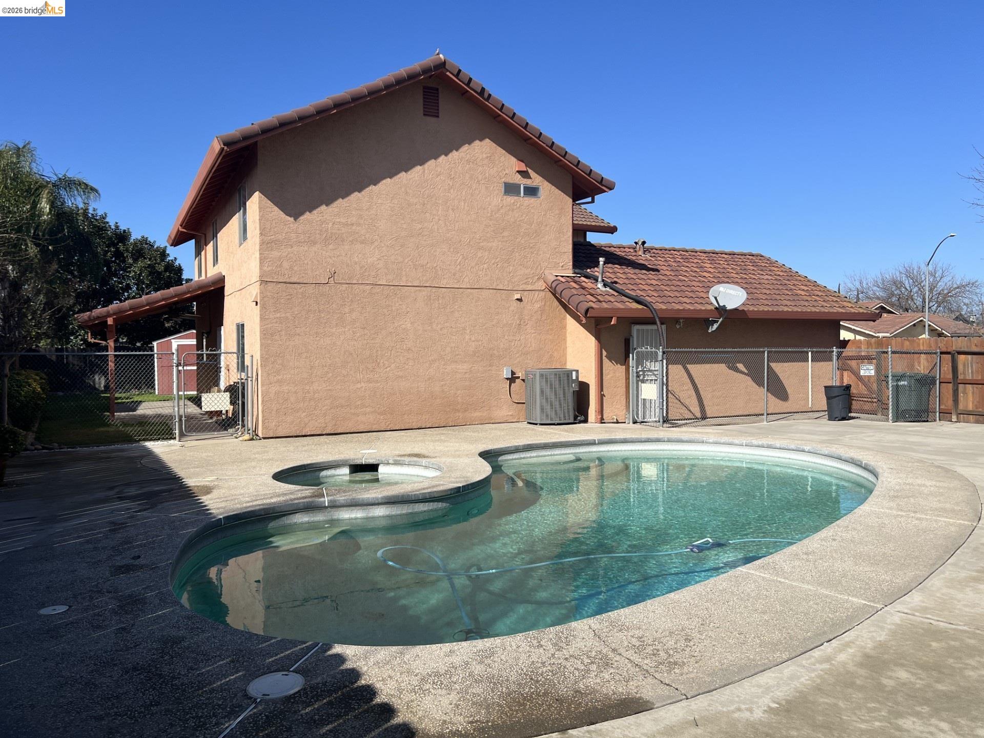 3816 Teek Court Ceres, CA 95307 - Photo 18 of 21 a view of a house with pool