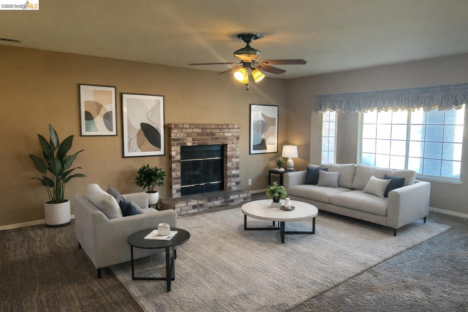 3816 Teek Court Ceres, CA 95307 - Photo 6 of 21 a living room with furniture a chandelier and a fireplace