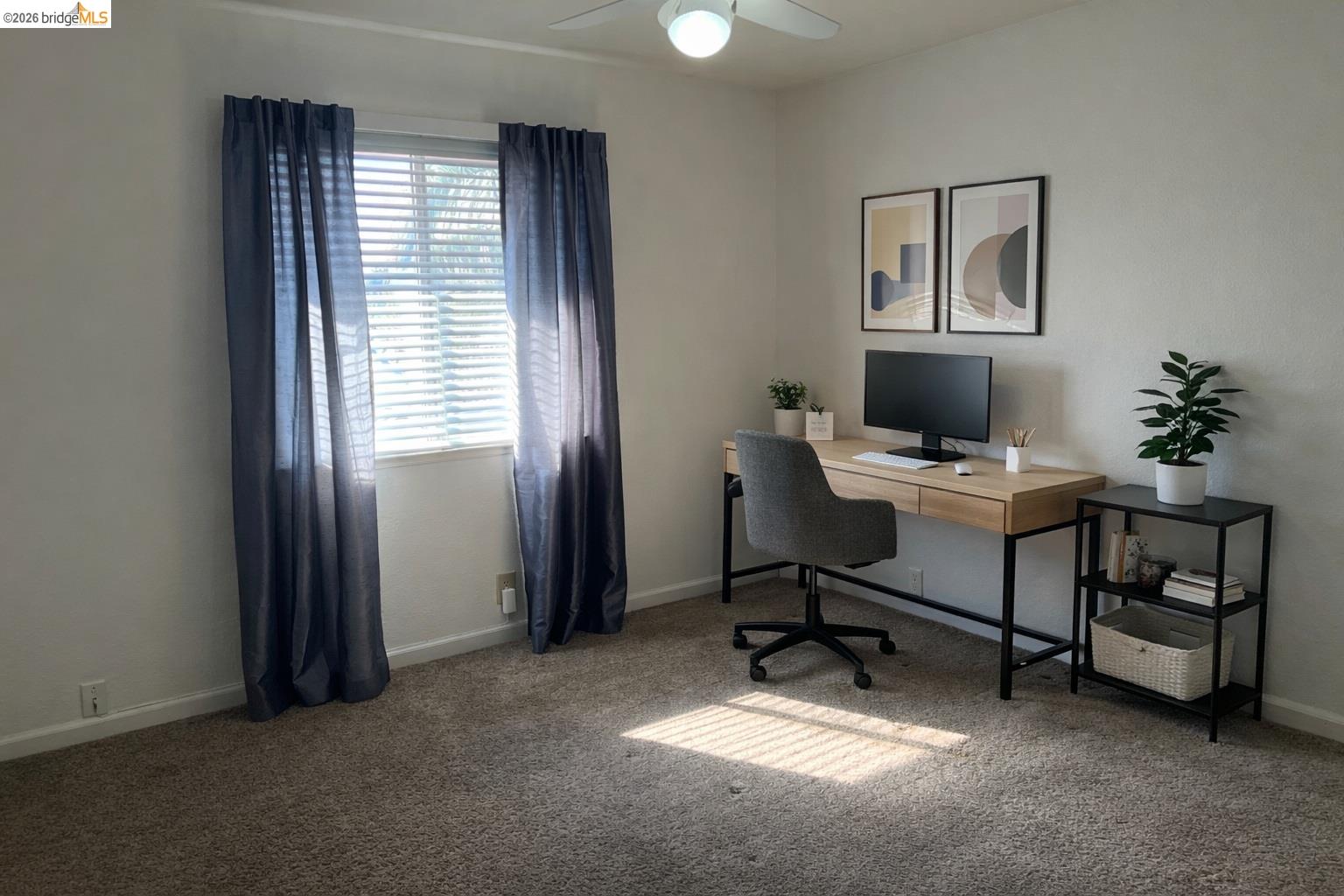 3816 Teek Court Ceres, CA 95307 - Photo 10 of 21 a view of a workspace with furniture and a window