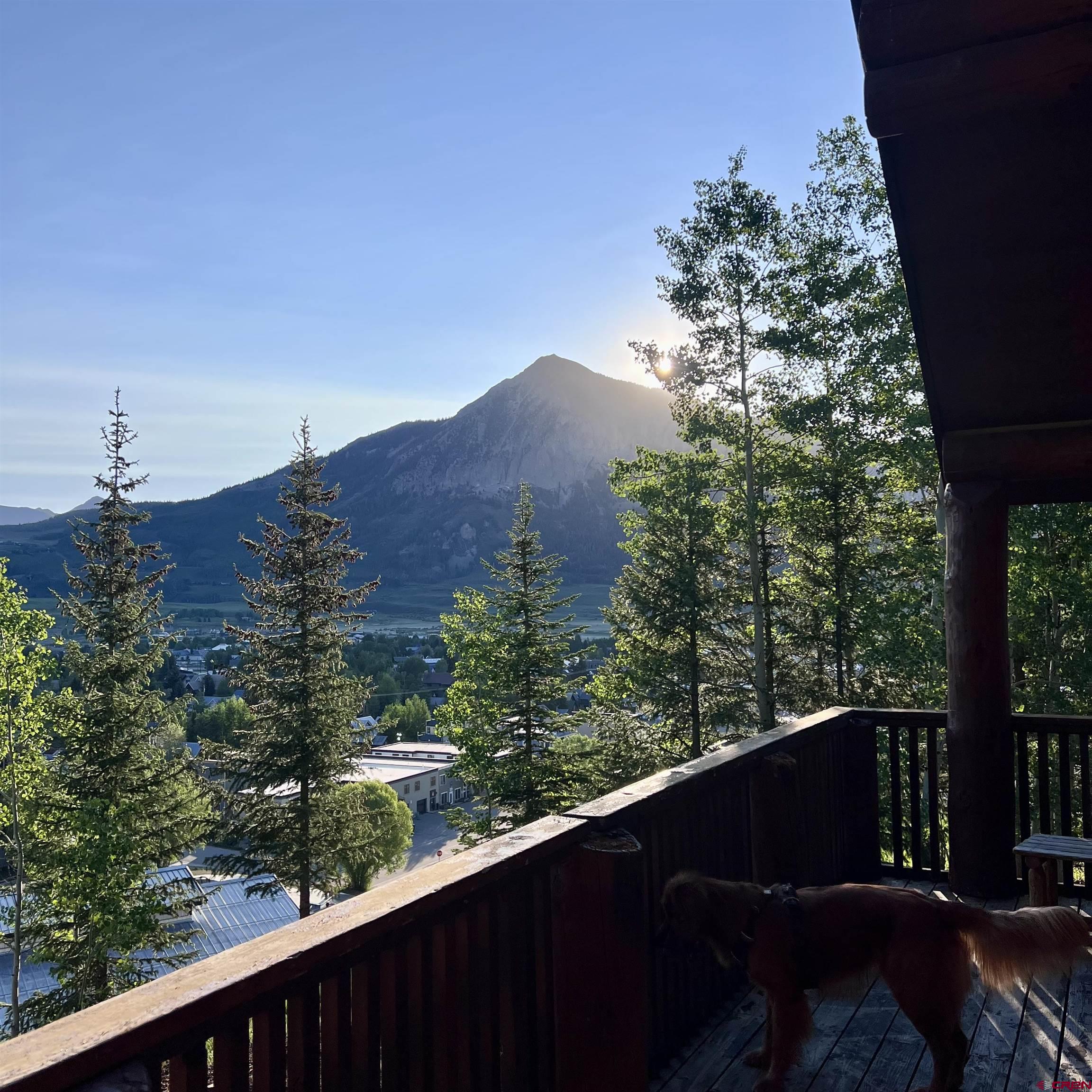 398 Journey's End Road Crested Butte, CO 81224 - Photo 23 of 42 a view of a balcony with an outdoor seating