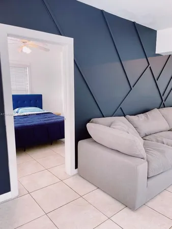 a living room with furniture and a table