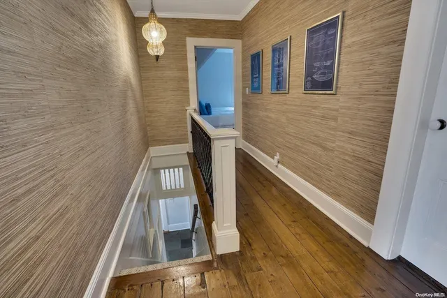 a view of balcony with wooden floor and stairs
