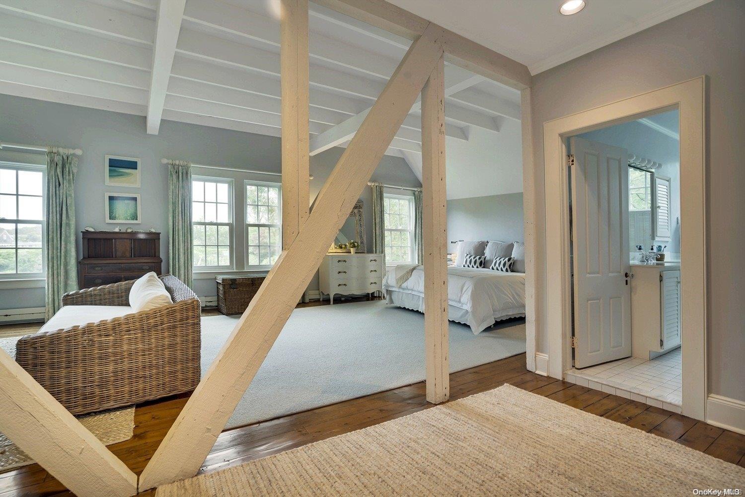 5 Shinnecock Road Quogue, NY 11959 - Photo 20 of 35 a living room with furniture and a large window