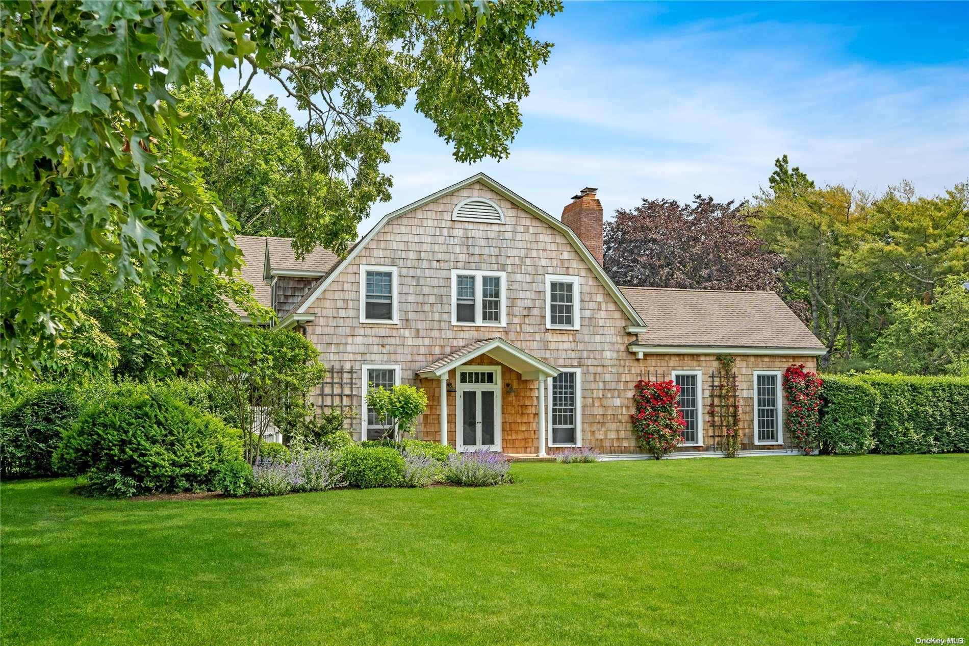 5 Shinnecock Road Quogue, NY 11959 - Photo 2 of 35 a view of a house with a yard