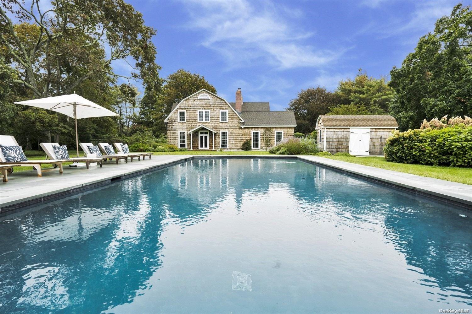 5 Shinnecock Road Quogue, NY 11959 - Photo 30 of 35 a view of swimming pool with a lake view