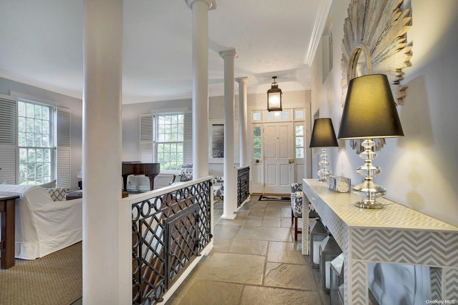 5 Shinnecock Road Quogue, NY 11959 - Photo 8 of 35 a spacious bathroom with a double vanity sink and a mirror