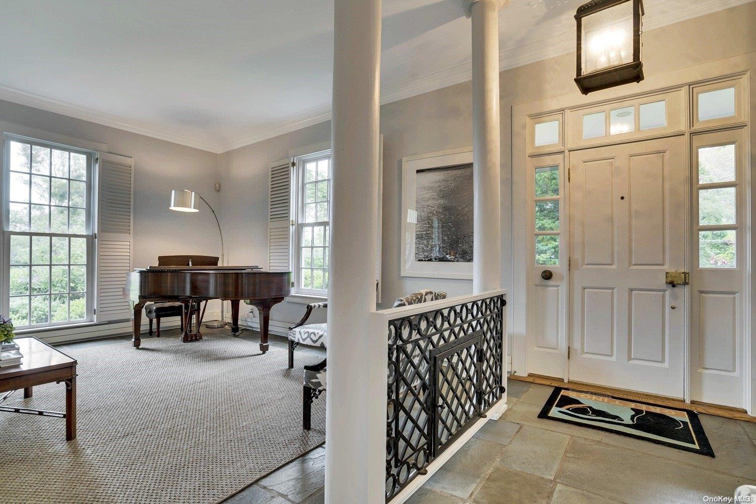5 Shinnecock Road Quogue, NY 11959 - Photo 9 of 35 a living room with furniture