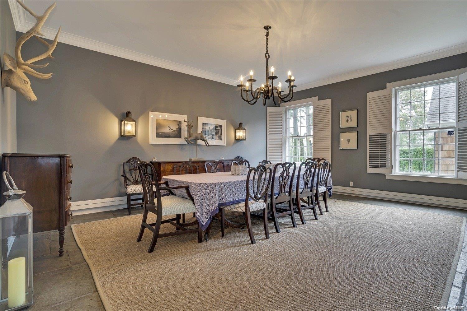 5 Shinnecock Road Quogue, NY 11959 - Photo 10 of 35 a view of a dining room with furniture window and outside view