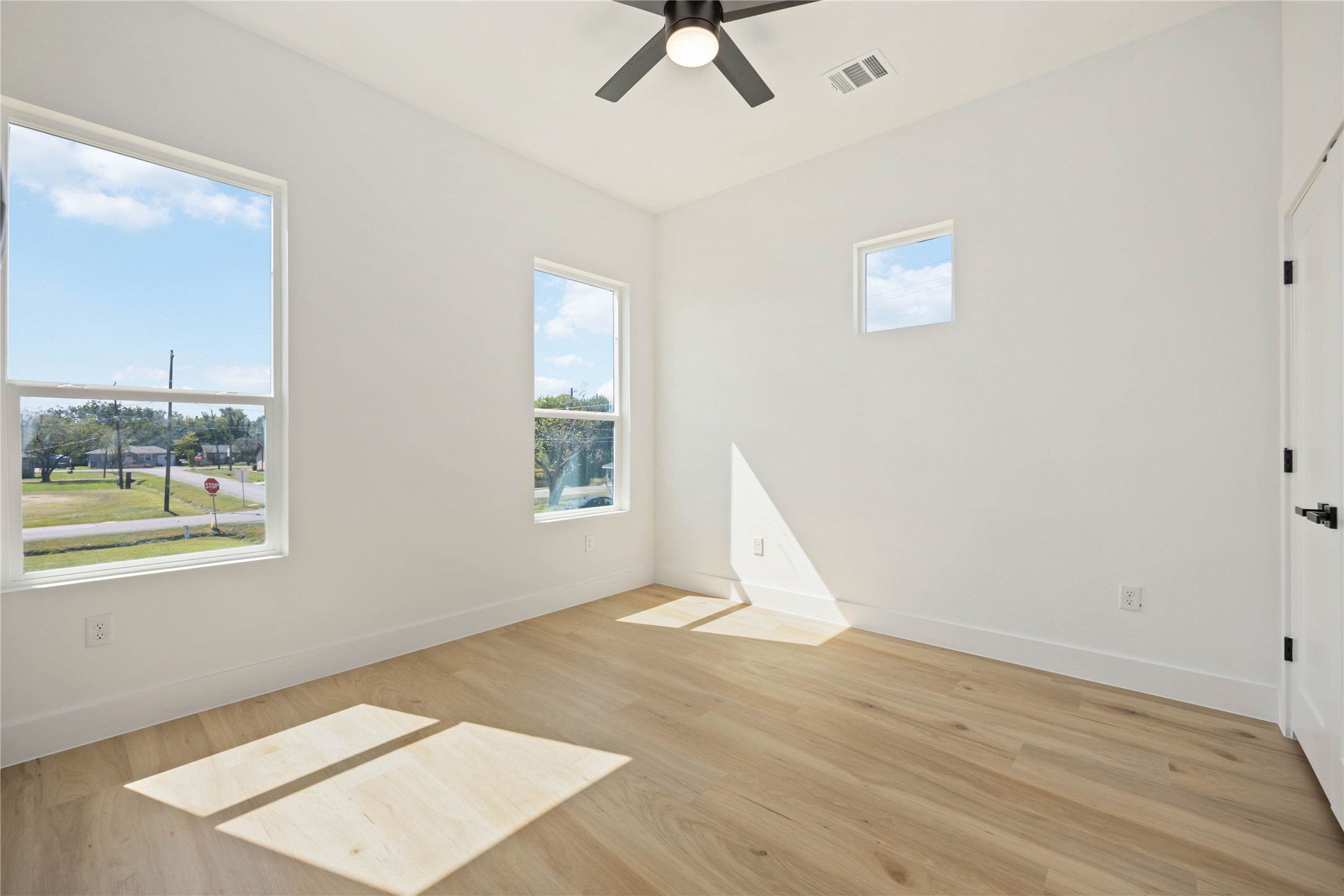 4202 Kewanee Street, Unit B Houston, TX 77051 - Photo 23 of 47 a view of an empty room with wooden floor and a window