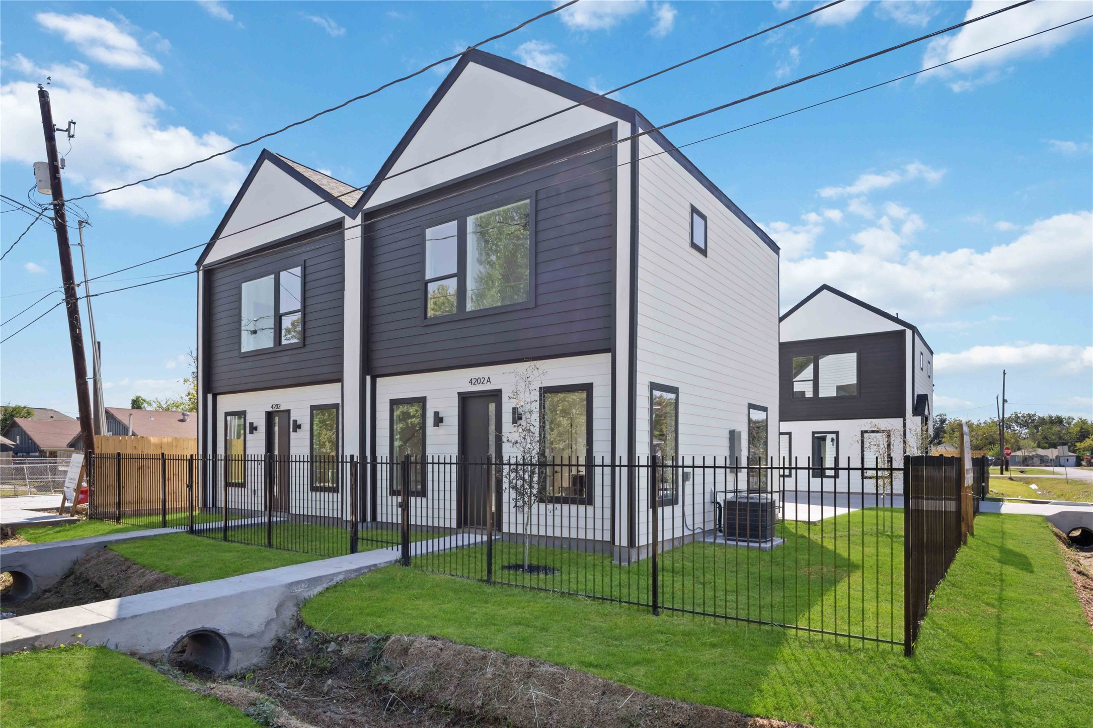 4202 Kewanee Street, Unit B Houston, TX 77051 - Photo 3 of 47 a view of a brick house next to a yard