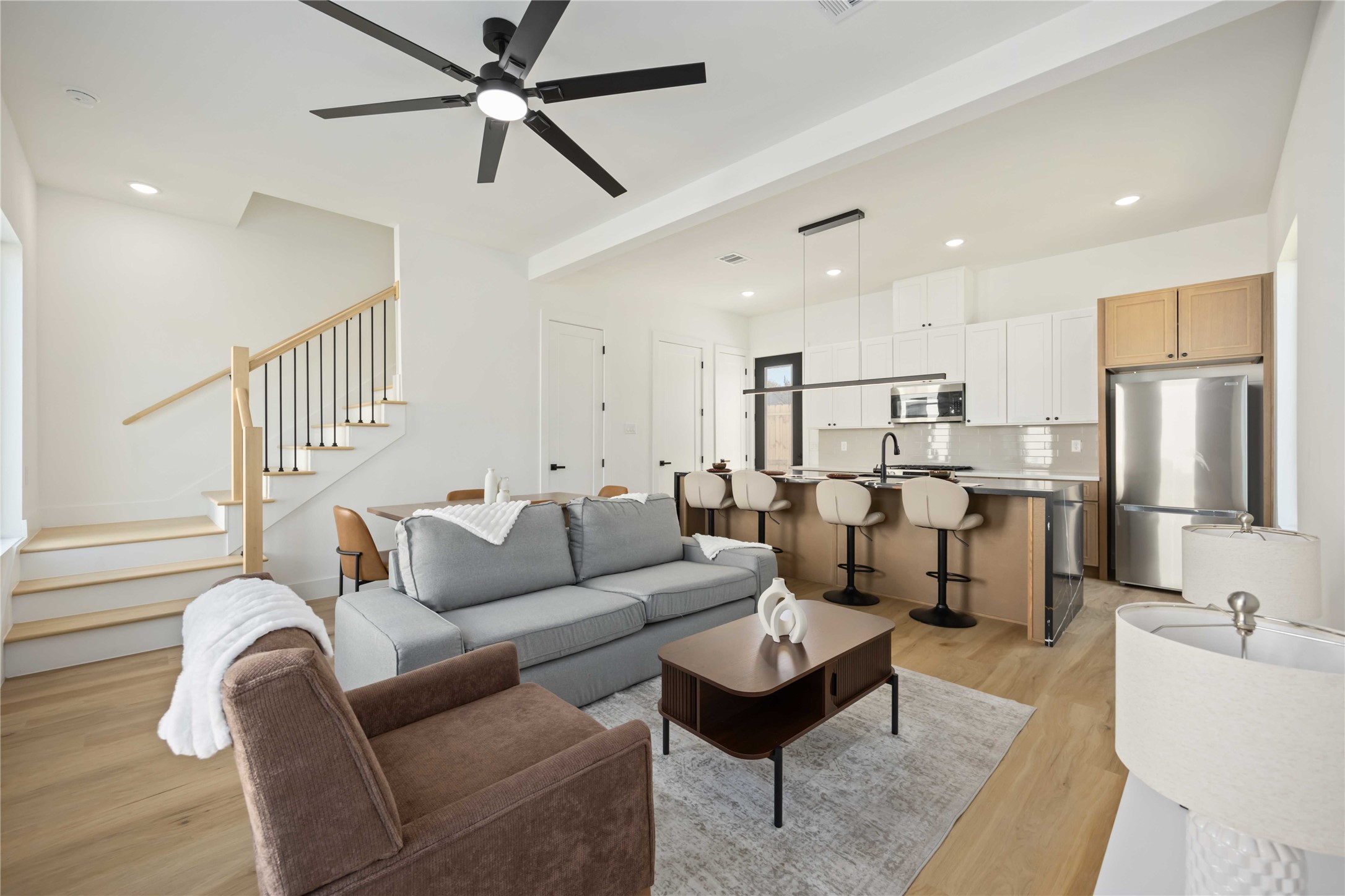 4202 Kewanee Street, Unit B Houston, TX 77051 - Photo 9 of 47 a living room with furniture kitchen view and a chandelier