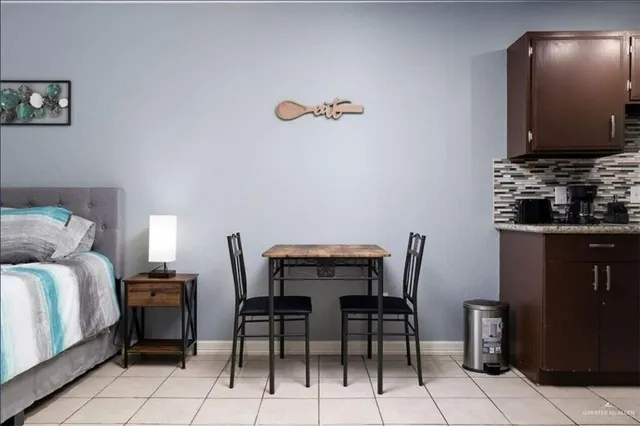 a view of a workspace with furniture