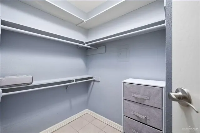 a view of an empty walk in closet