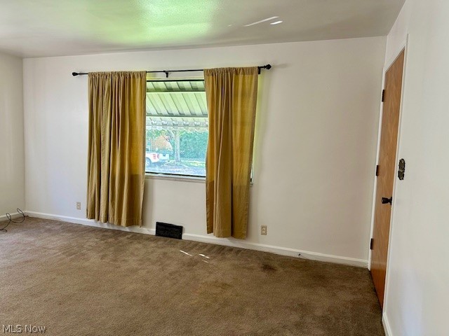 751 Thayer Street, Unit DOWN Akron, OH 44310 - Photo 4 of 25 View of carpeted spare room