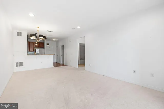 a view of a kitchen with a sink