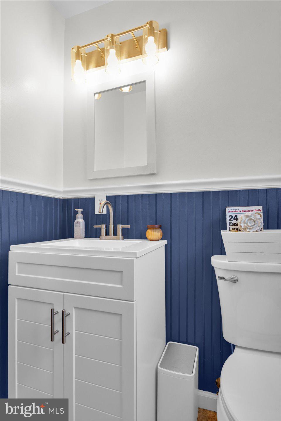 306 East Rudderow Avenue Maple Shade, NJ 08052 - Photo 20 of 38 a bathroom with a toilet sink and mirror