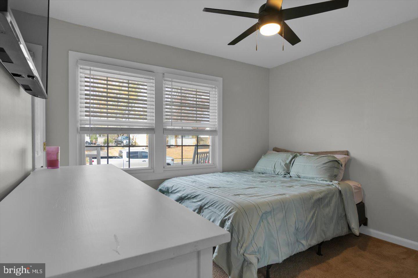 306 East Rudderow Avenue Maple Shade, NJ 08052 - Photo 30 of 38 a spacious bedroom with a bed a dresser and a window