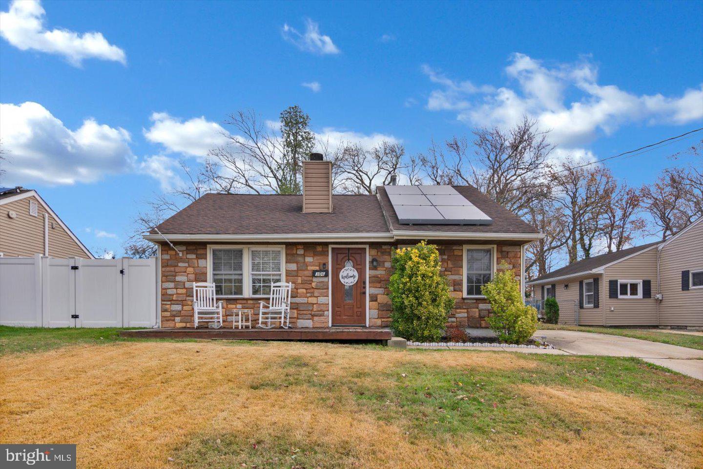 306 East Rudderow Avenue Maple Shade, NJ 08052 - Photo 37 of 38 a front view of a house with a garden