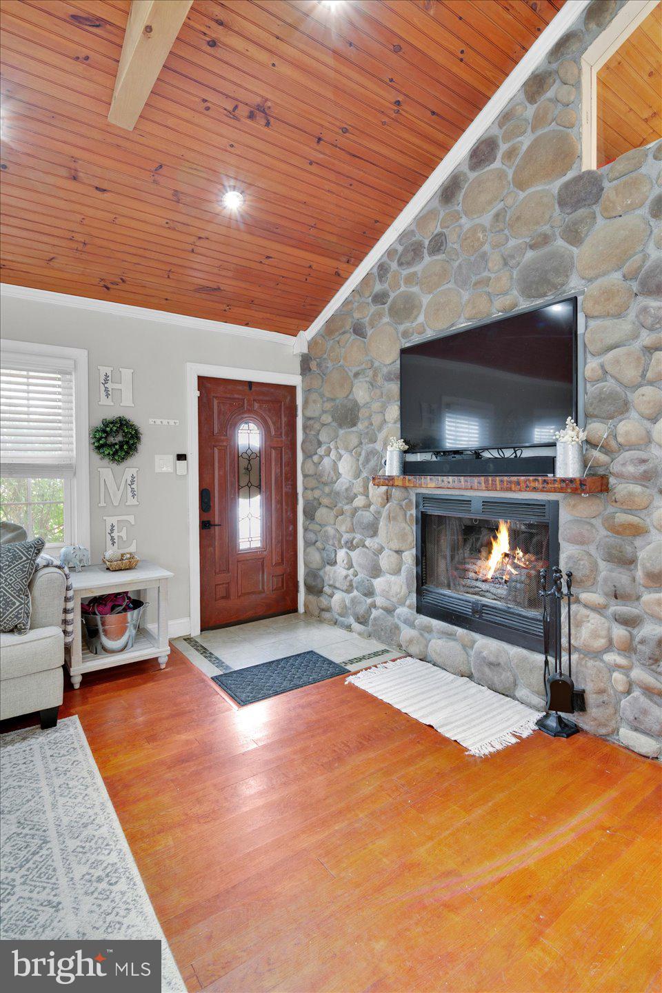 306 East Rudderow Avenue Maple Shade, NJ 08052 - Photo 6 of 38 a room with fireplace and a fireplace