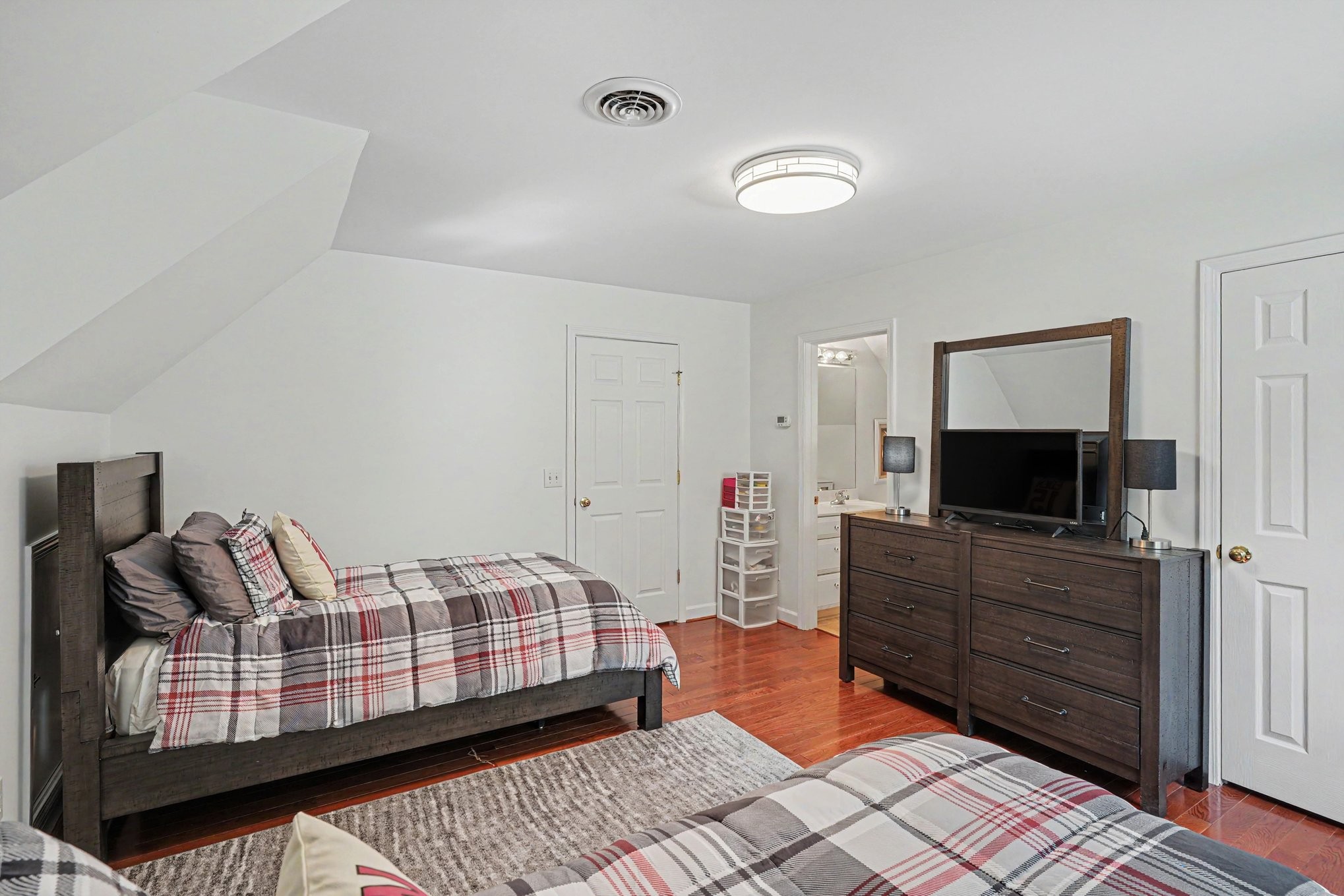 5833 Highway 76 East Springfield, TN 37172 - Photo 29 of 66 a bedroom with a bed and flat screen tv