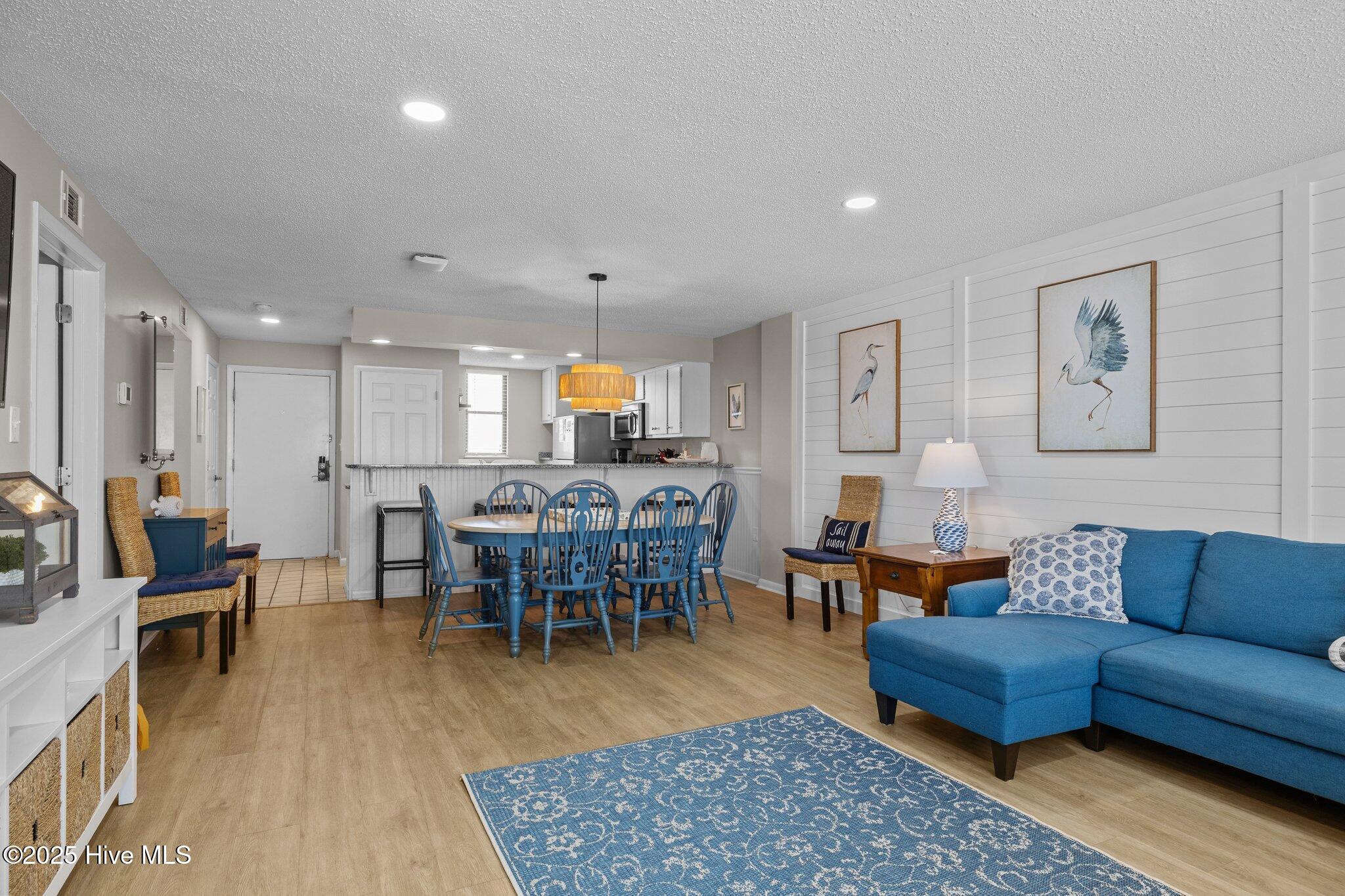 1505 Salter Path Road, Unit 409 Indian Beach, NC 28512 - Photo 14 of 29 Living, Dining, and Kitchen Space