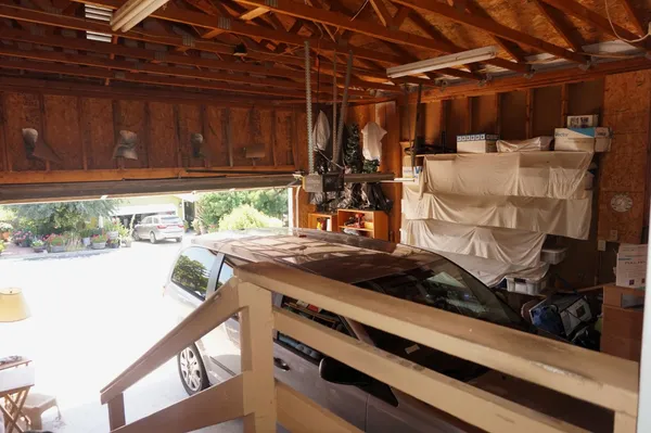 a kitchen with an oven a stove and a refrigerator
