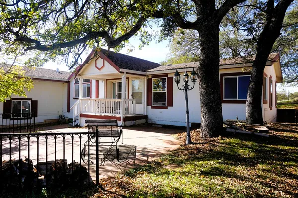 a house view with a outdoor space