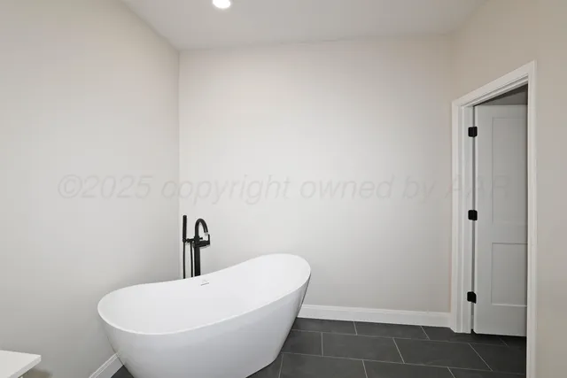 a bathroom with a toilet and a sink