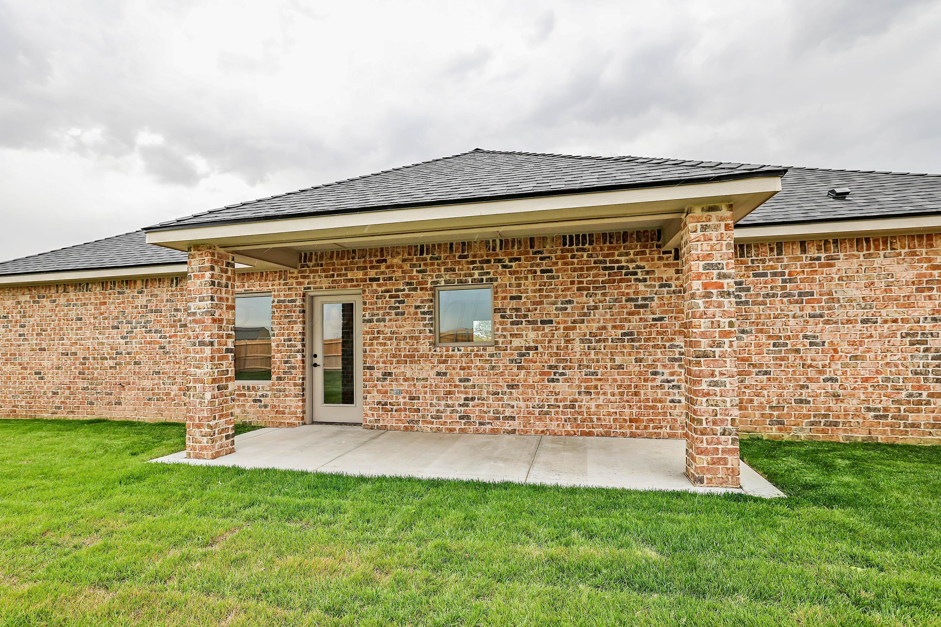 18150 Mid-Country Boulevard Amarillo, TX 79119 - Photo 23 of 25 a view of a patio with a garden