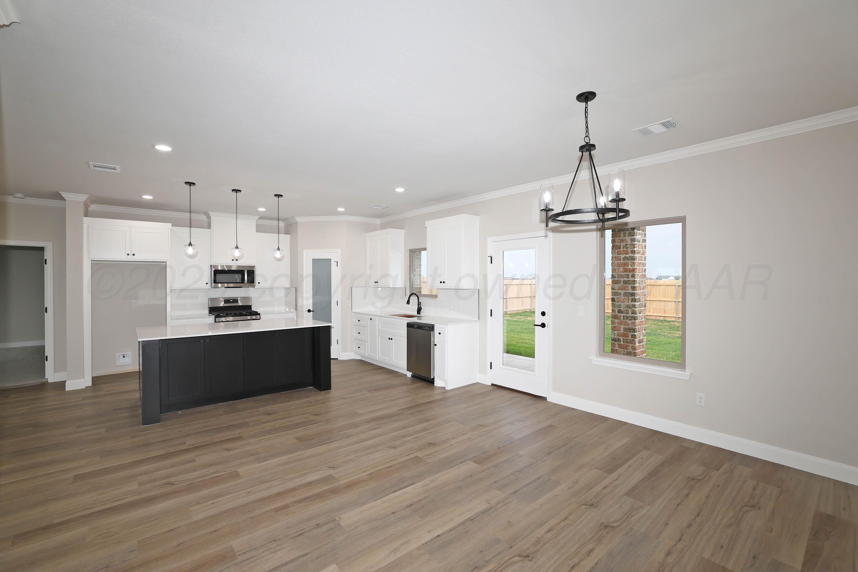 18150 Mid-Country Boulevard Amarillo, TX 79119 - Photo 6 of 25 a view of kitchen with refrigerator and window