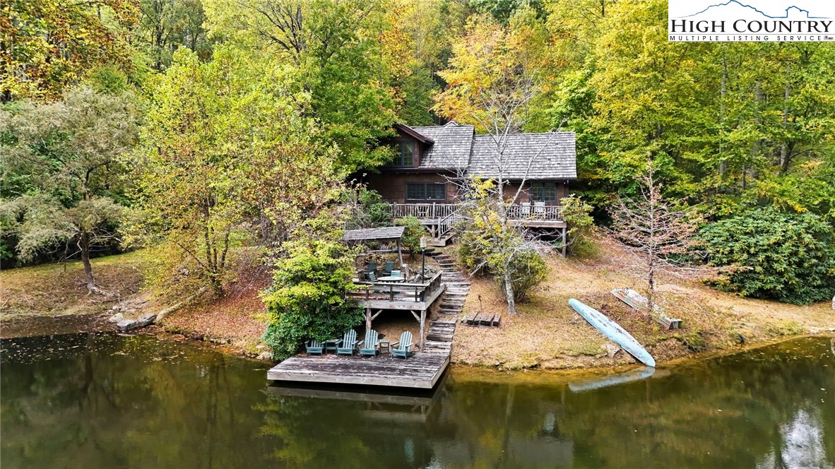 423 Beaver Dam Farm Road Vilas, NC 28692 - Photo 11 of 15 a view of house with ocean view