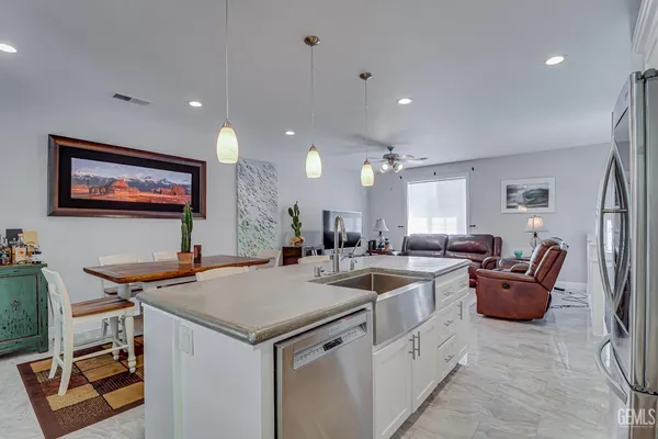 a view of a kitchen and living room