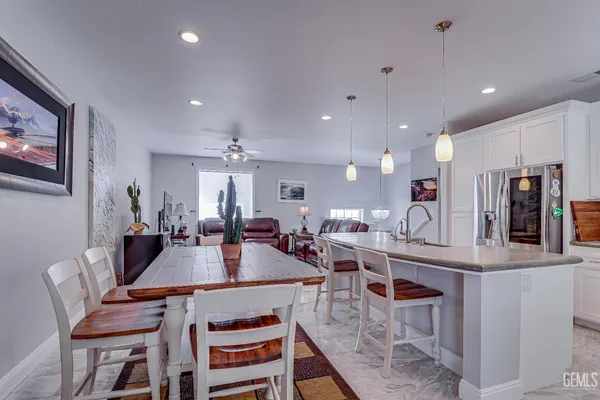 a view of a dining room with furniture