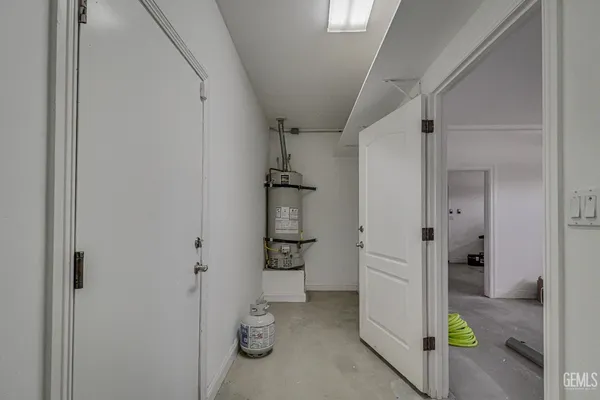 a bathroom with a tub and shower