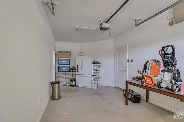 a view of a storage & utility room with toys