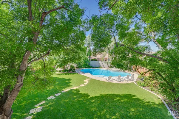 a view of a swimming pool with an outdoor space