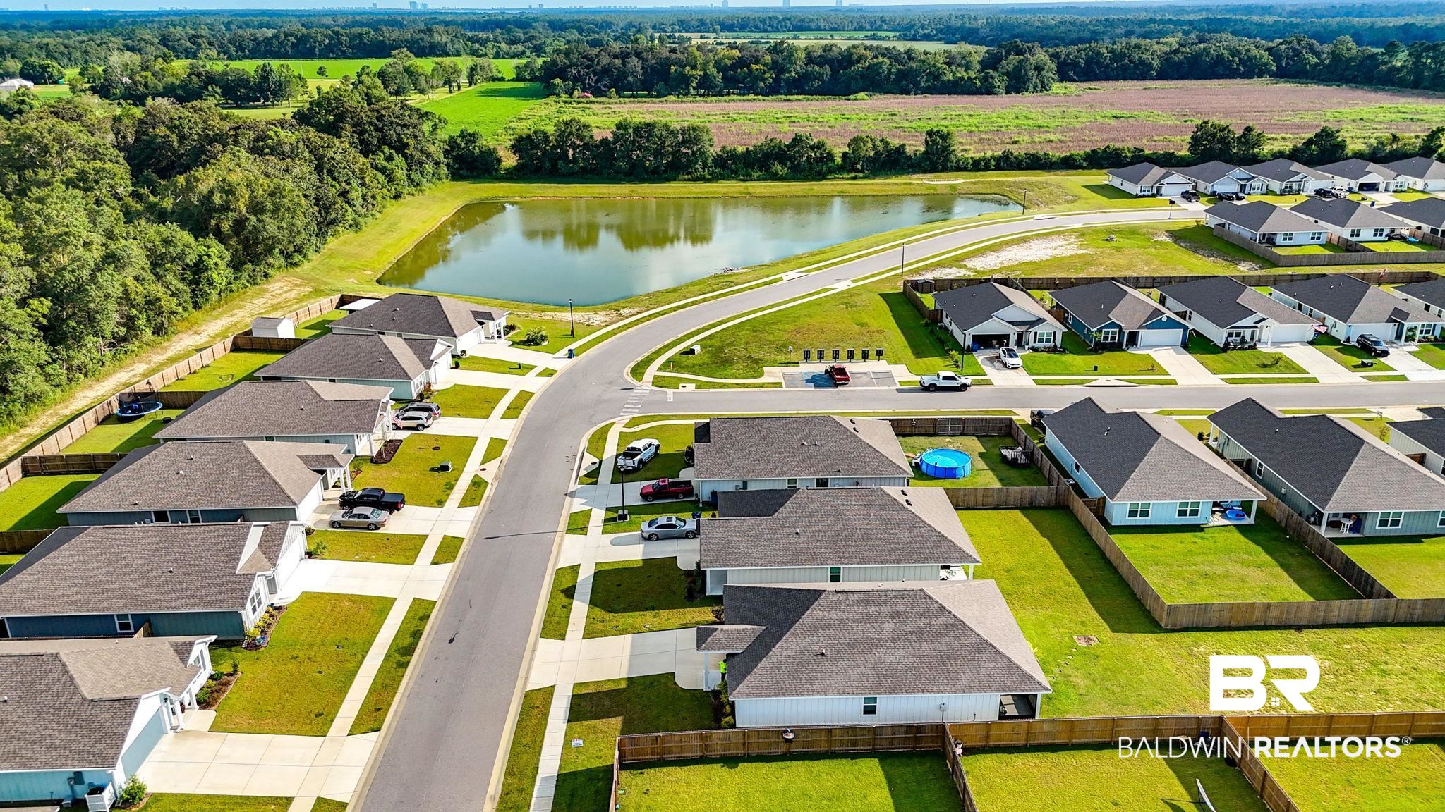 24264 Veranda Circle Elberta, AL 36530 - Photo 14 of 41 Aerial view of residential area with a nearby body of water