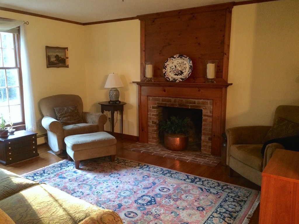 79 Strong Road Southampton, MA 01073 - Photo 12 of 30 a living room with furniture and a fireplace
