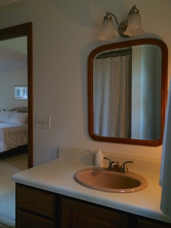 79 Strong Road Southampton, MA 01073 - Photo 19 of 30 a bathroom with a sink and a mirror