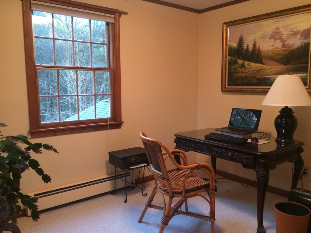 79 Strong Road Southampton, MA 01073 - Photo 20 of 30 a living room with furniture and a window