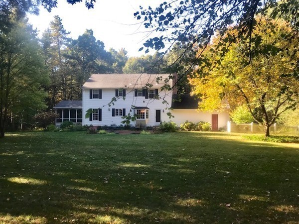 79 Strong Road Southampton, MA 01073 - Photo 2 of 30 a view of a big house with a big yard plants and large trees