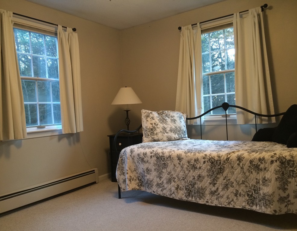 79 Strong Road Southampton, MA 01073 - Photo 24 of 30 a bedroom with a bed and window