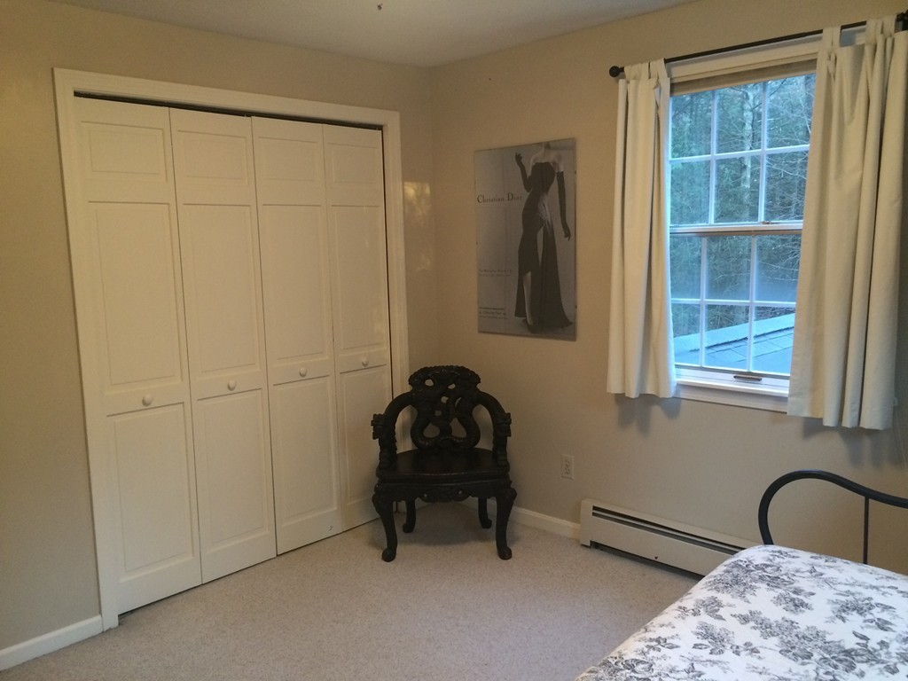 79 Strong Road Southampton, MA 01073 - Photo 25 of 30 a room with a chair and a window