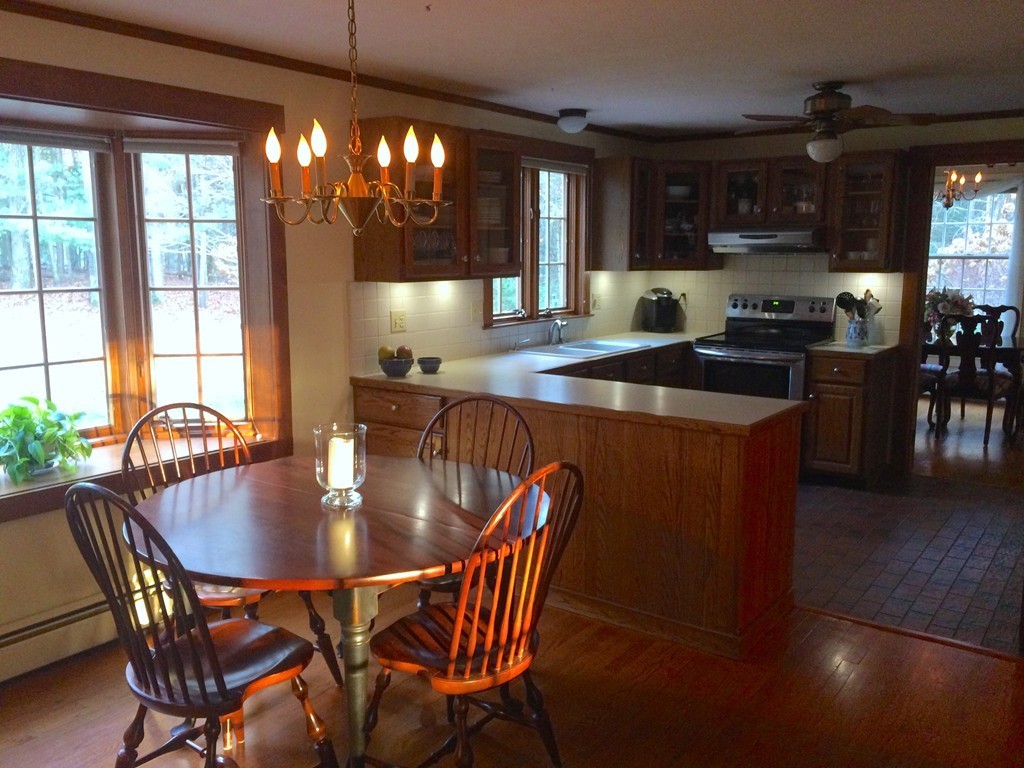 79 Strong Road Southampton, MA 01073 - Photo 4 of 30 a kitchen with a dining table chairs and window
