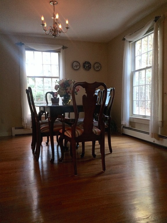 79 Strong Road Southampton, MA 01073 - Photo 5 of 30 a view of a dining room with furniture window and wooden floor